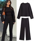 Woman wearing a black outfit with 'Trafza' branding on clothing images.